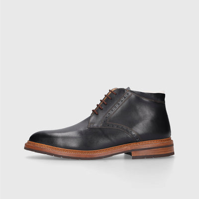 Men's boots with perforated pattern